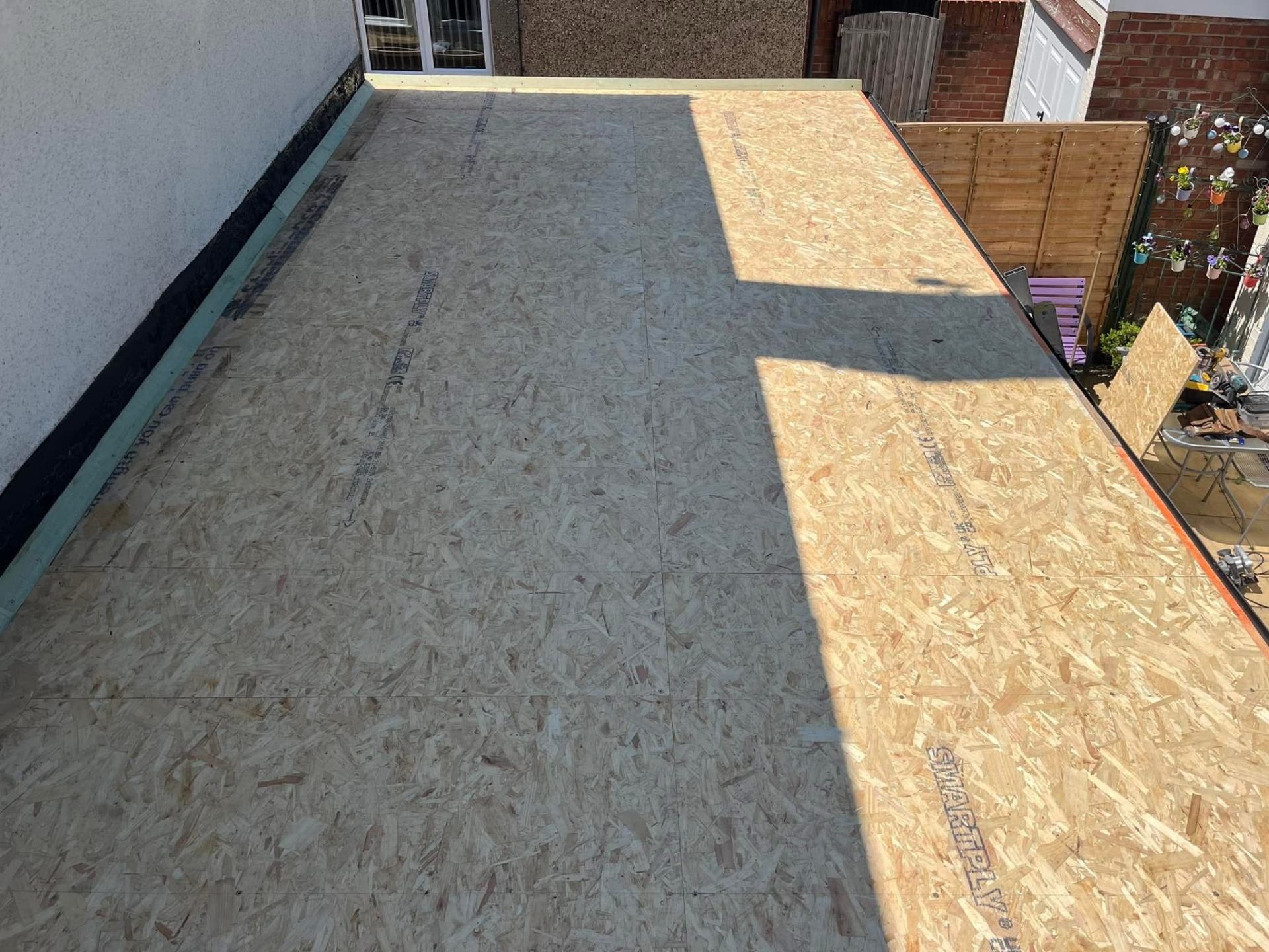 Flat roof OSB decking preparation before EPDM installation