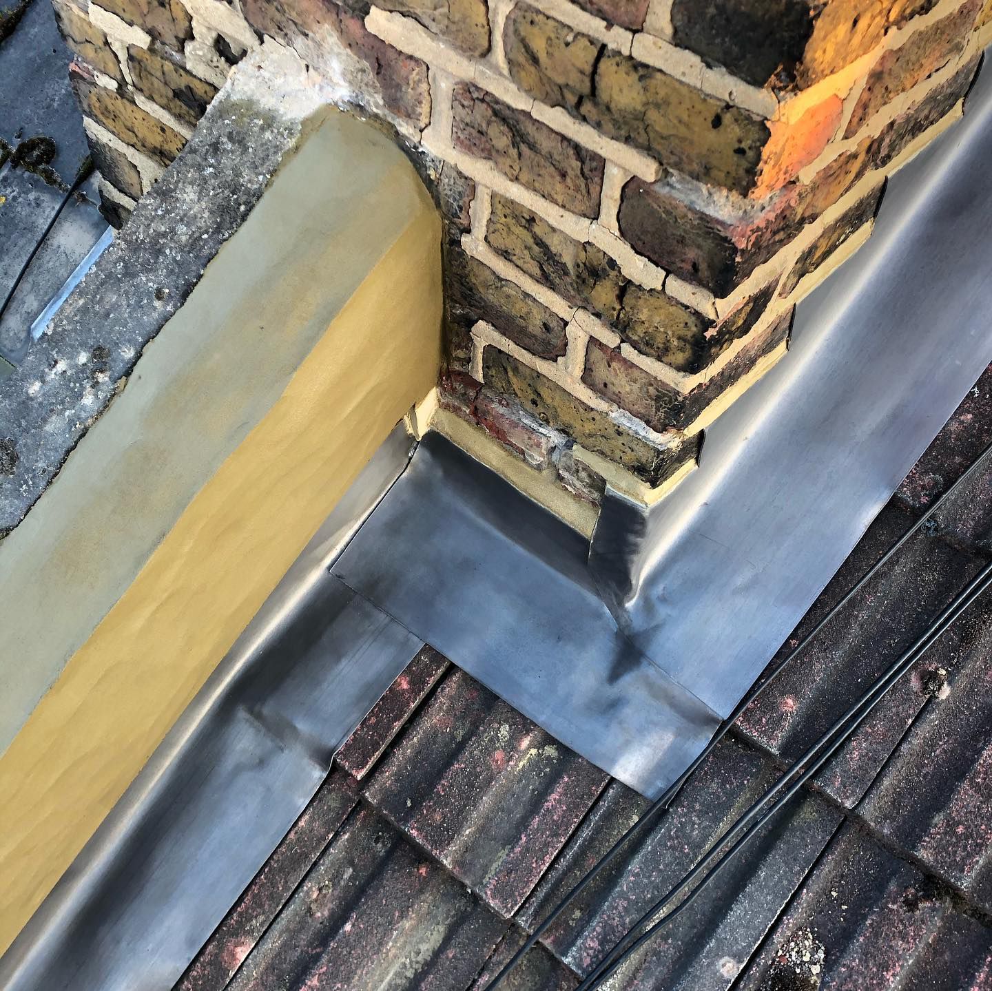 Lead flashing detail around chimney stack