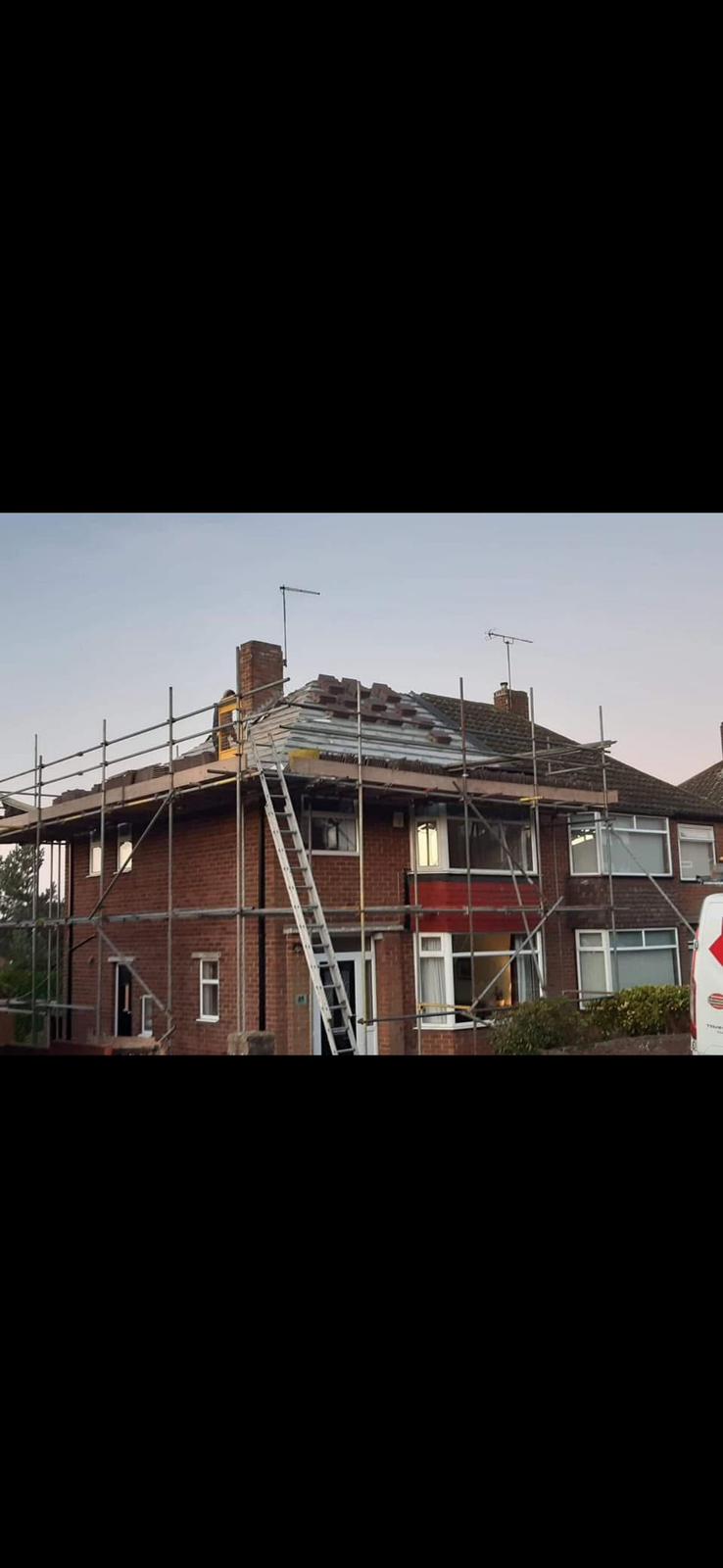 Residential rooftops and chimneys in Chilton, County Durham